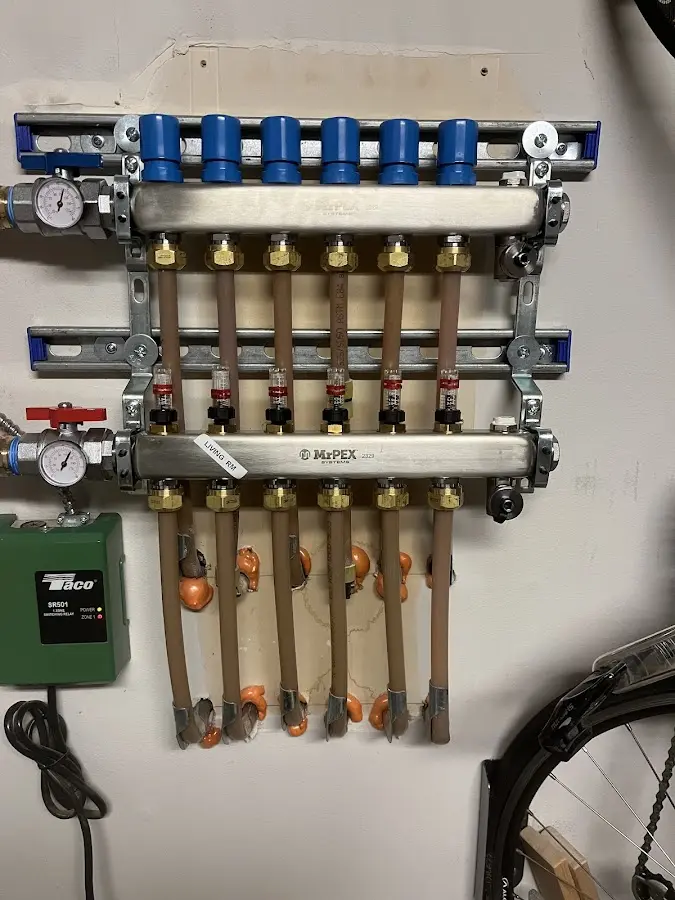 Plumber performing Gas Leak Detection at a residential property in Tupper Lake